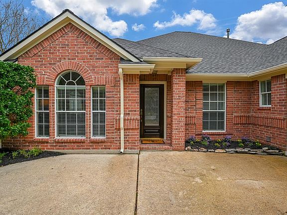 Elegant and welcoming entryway! The gorgeous mahogany glass beveled door welcomes you home.