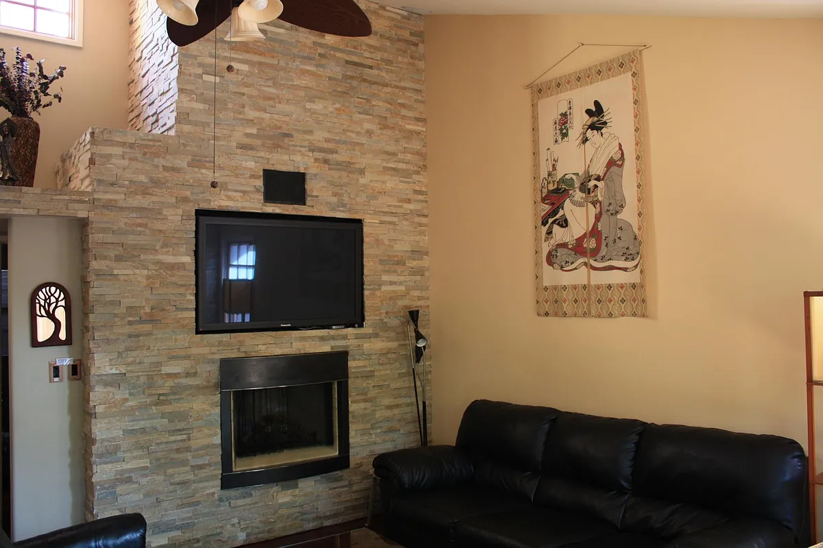 Beautiful stonework with gas fireplace, opening for a TV - 4015 Morrell St
