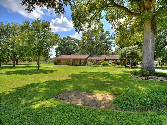 Situated on 1.8 acres just outside the city limits.
