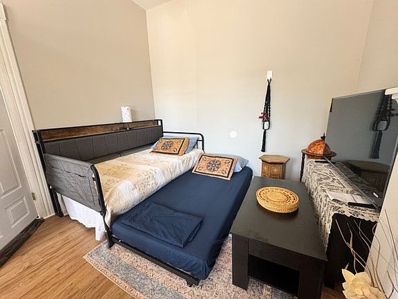 The trundle bed has a twin below that can serve as another twin bed for two people to have their own bed to sleep in.