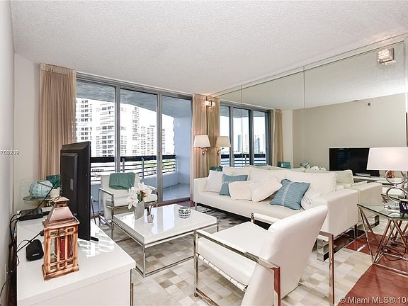 3rd image of 3600 Mystic Pointe Dr APT 803