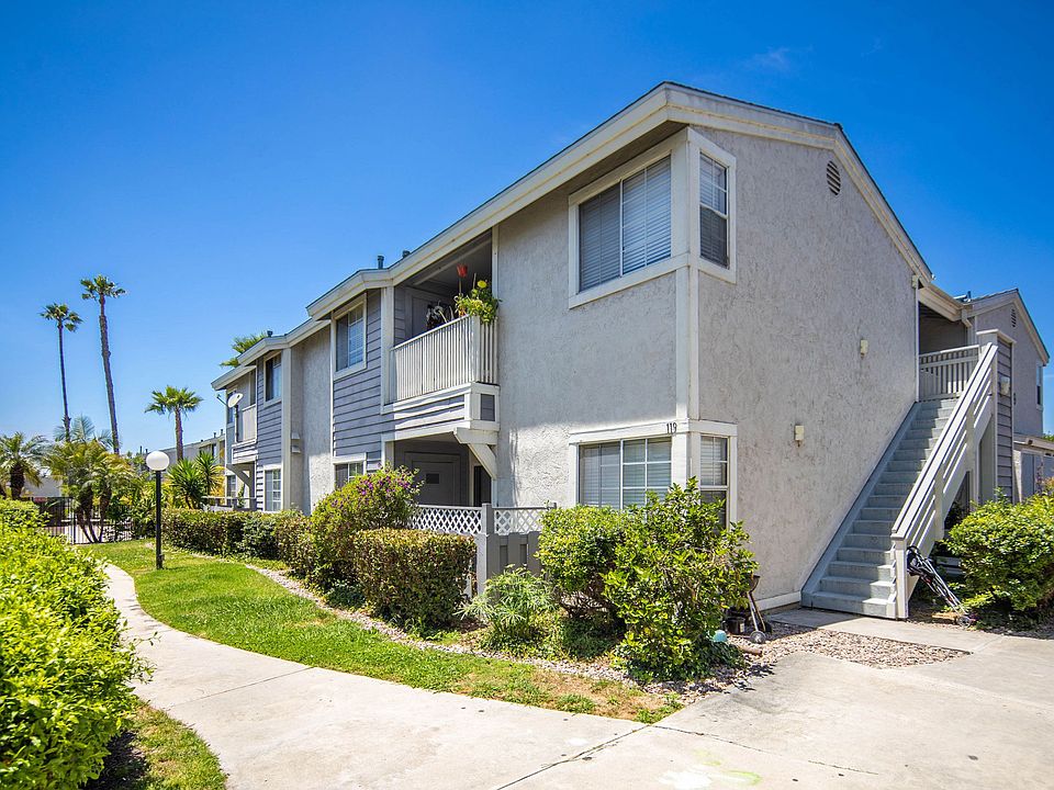 One of the two-story apartment buildings at Presidio Villa Apartments.