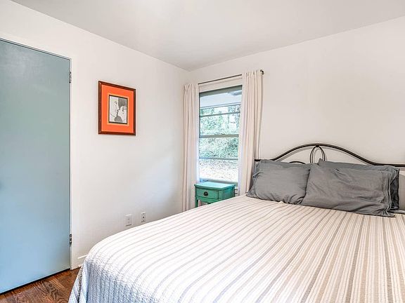 furnished bedroom (old headboard shown)