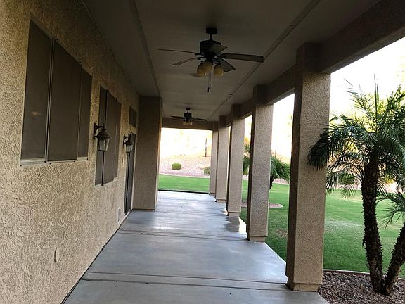 Full covered patio and upstairs balcony