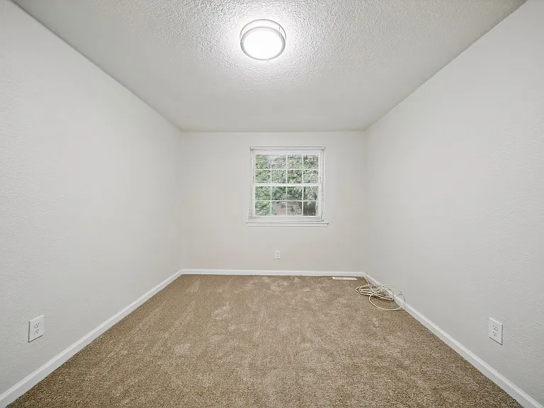 Primary Bedroom Window (backyard view right side)