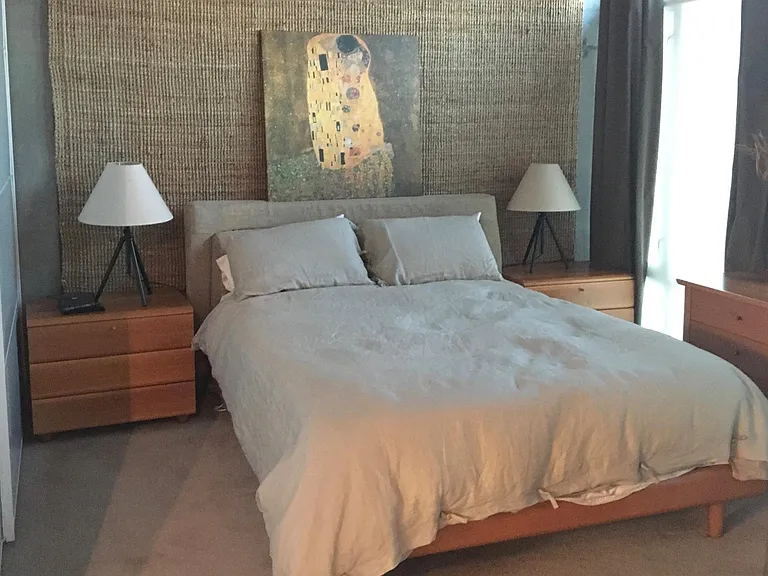 Bedroom area with queen bed