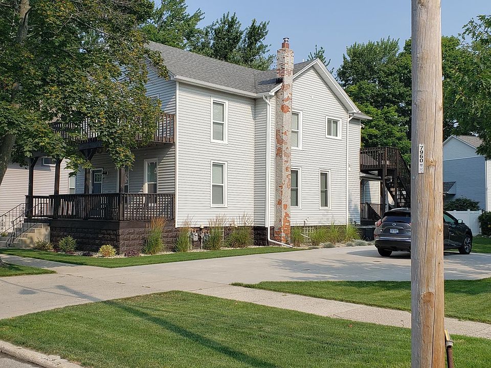 Exterior: Parking area and large yard