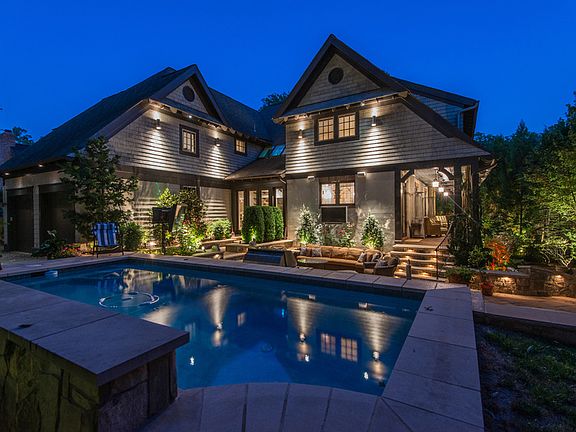 Rear Oasis w/stunning landscaping & hardscaping