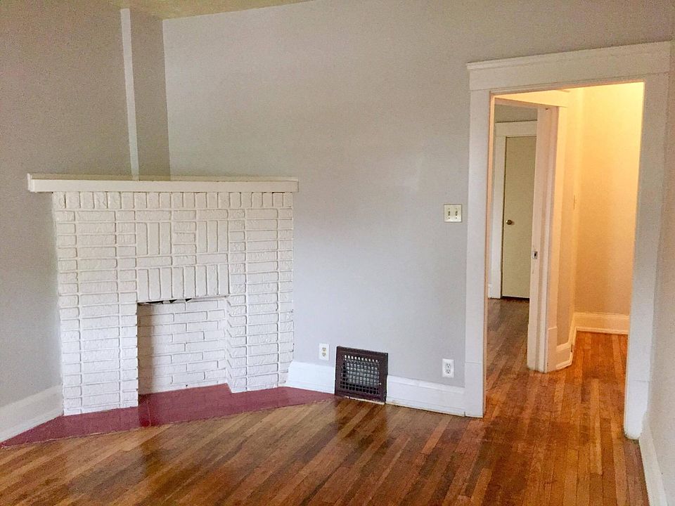 Living room with original fireplace!