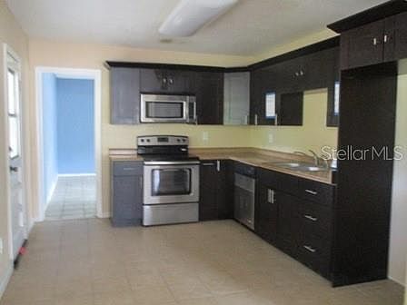 5th image of 7029 60th Way N