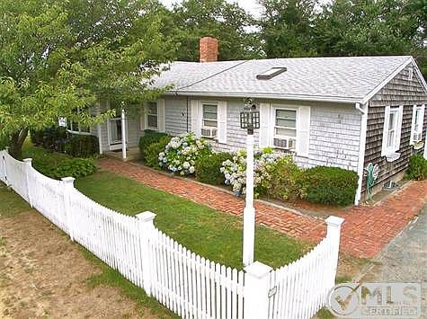 Front view of house and walkway.