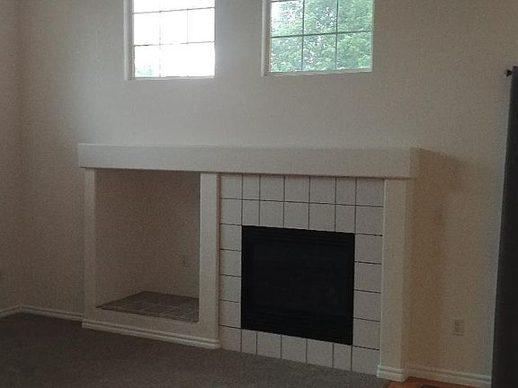 living room with gas fireplace