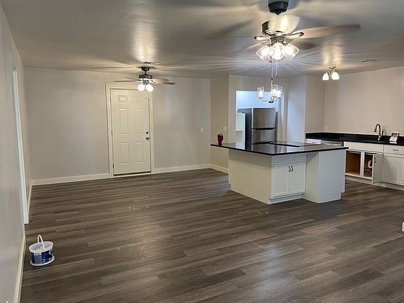 Open kitchen, dining & living area