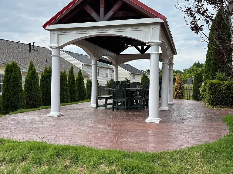 Pavilion (20 feet x 10 feet) secured to the patio with three foot footers.