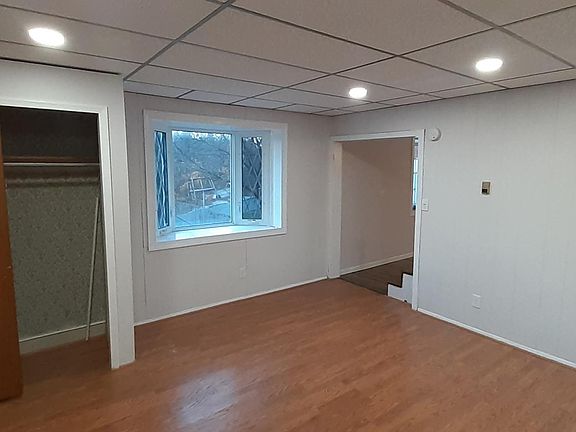 Front living room and closet. Nice Bay window