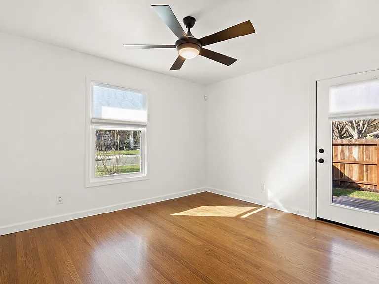 Primary bedroom (different angle digitally altered w/ furniture removed)