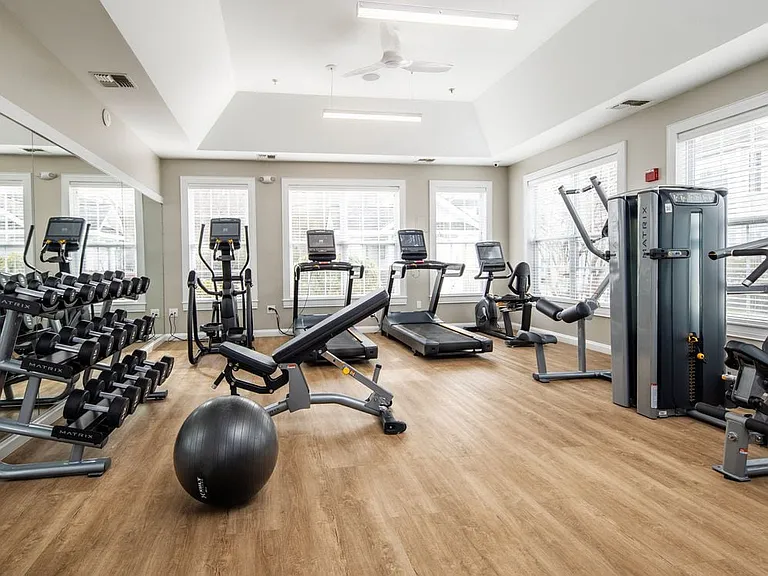 eaves Wilmington West fitness center with strength and cardio equipment