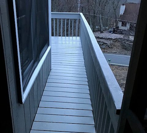 This is the side of the wrap around deck the beautiful home has to offer