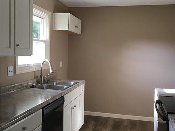 Kitchen, all new cabinets, counter tops, dishwasher, electric range