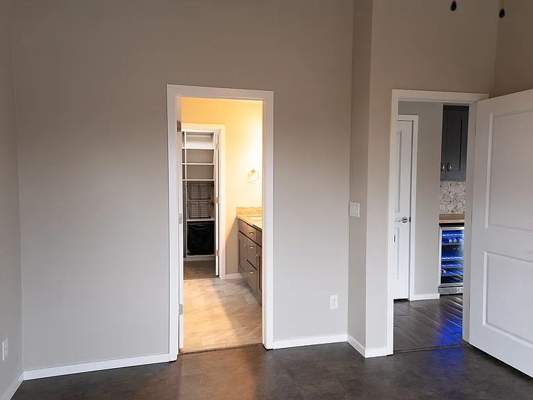 View from master bedroom - door to the living room and door to the bath and the walk-in closet