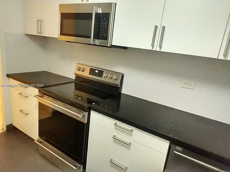 6039 Collins Ave #407 — Photo 13