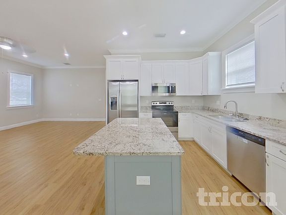 5th image of 7703 N Huntley Ave