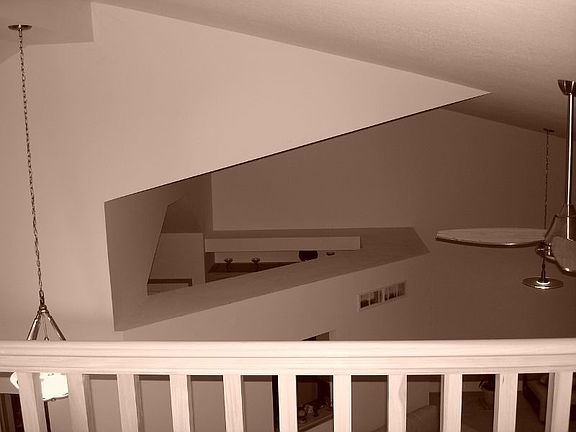 Loft, looking down over great room, kitchen, and plant shelves