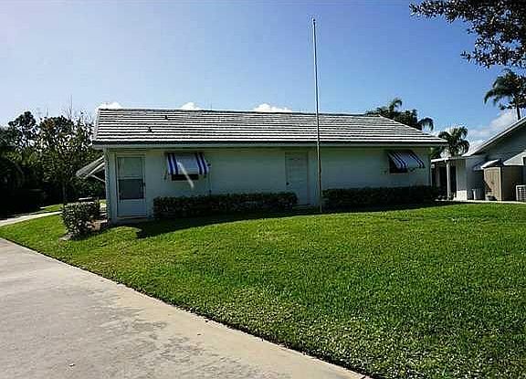 Exterior Front. 3Car detached garage with 400 SF efficiency