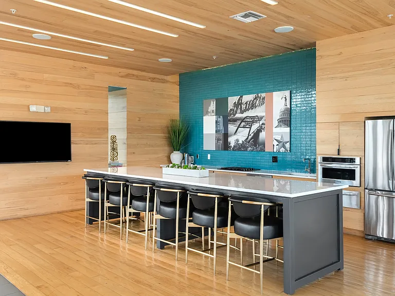 Resident Kitchen Space with Built-In Ovens and Premium Finishes