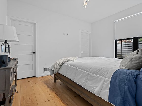 First floor bedroom with walk-in closet and full bathroom