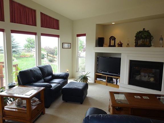 Living Room Has Windows & Views Along One Side!