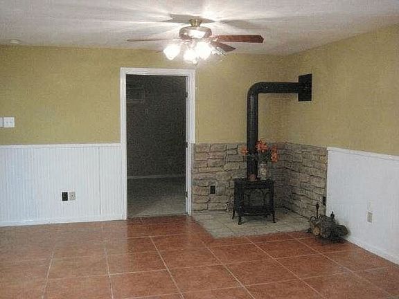 Cozy wood burning fireplace.