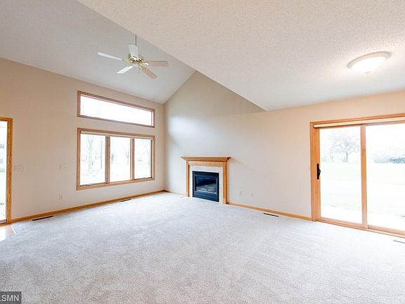 Large vaulted living with gas fireplace