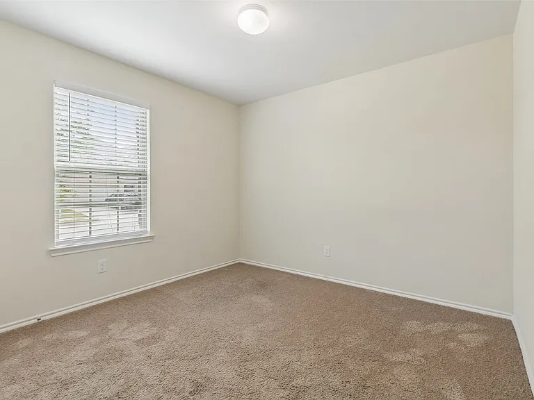 Neutral tone walls with white trim