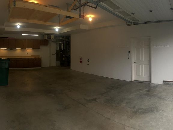800 square ft. Garage. Big enough for two cars, storage and workshop or exercise room