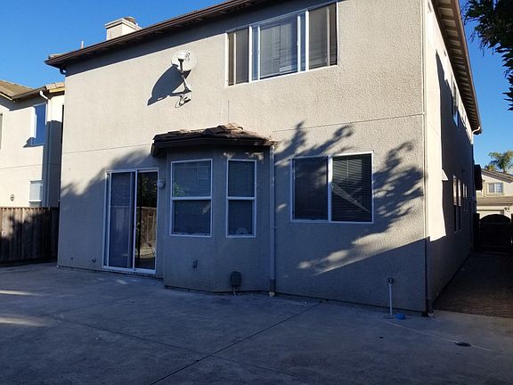 Back of house + backyard.