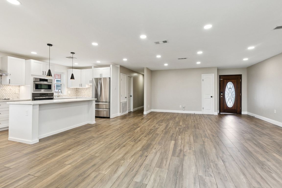 Open concept living, dining, kitchen