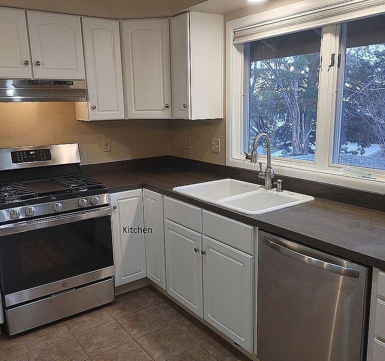 Kitchen with new range and DW.