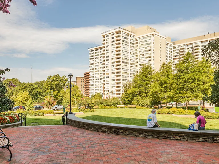 Surrounded by lush landscapes and park spaces.