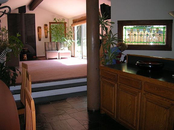 Living room w/ wood burning stove