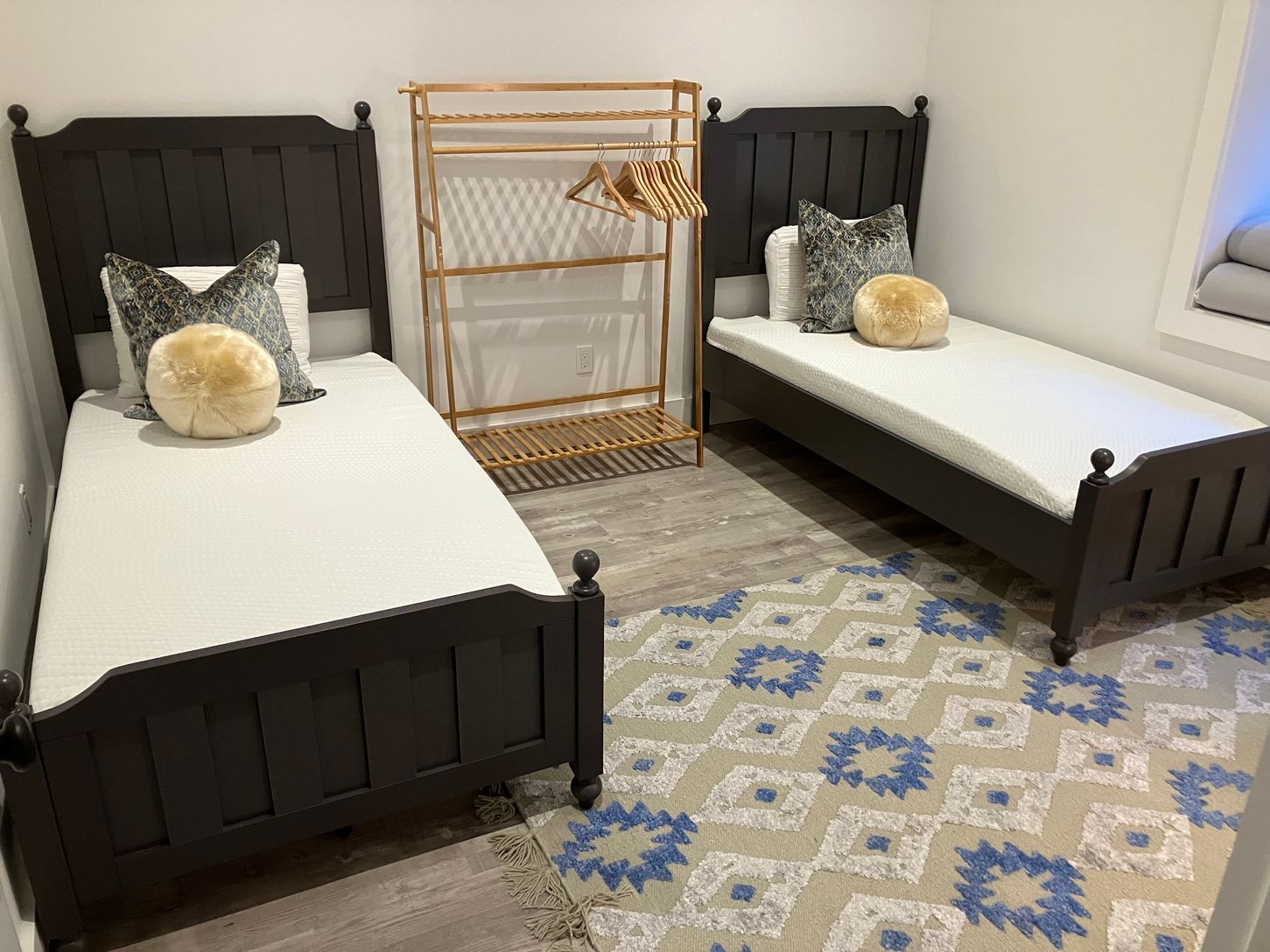 Guest five on lower level with two twin beds steps away from full bath