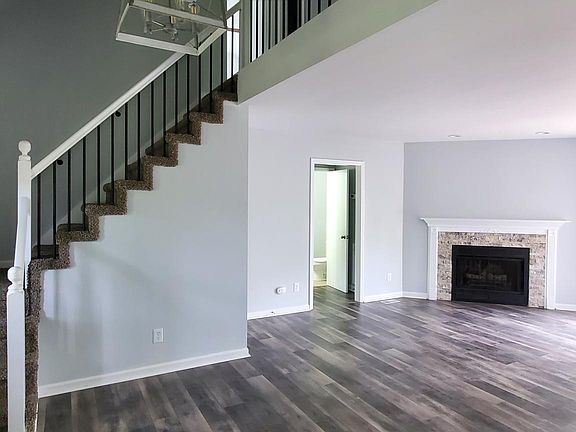 open living room with propane fireplace