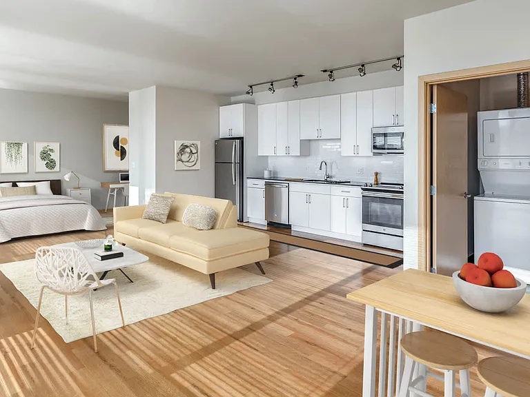 Living Room with Hard Surface Flooring and In-Home Washer and Dryer