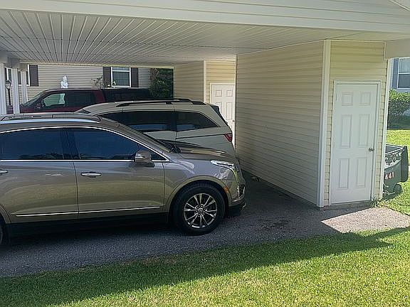 Carport and storage shed