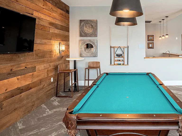 Our clubhouse offers a fun and vibrant space with a billiards table and a variety of games, perfect for relaxing and socializing with friends and neighbors.