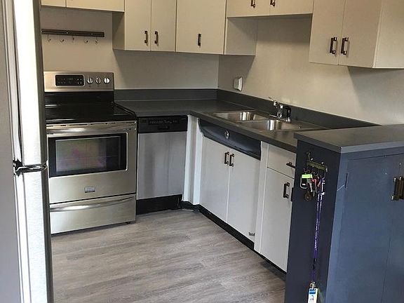 Updated kitchen with new floor and dishwasher, stainless energy star certified appliances.