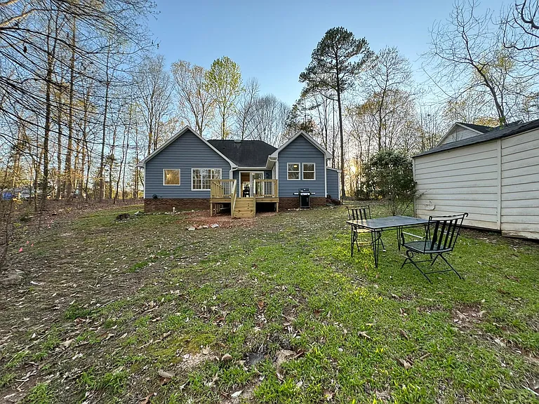 Large backyard with deck