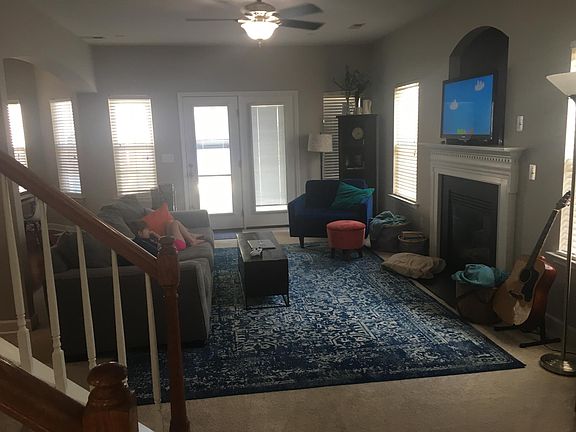 Open concept living Room; French door leads out to patio