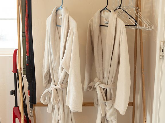 Clothing rack for use (no closet, but dresser also provided)