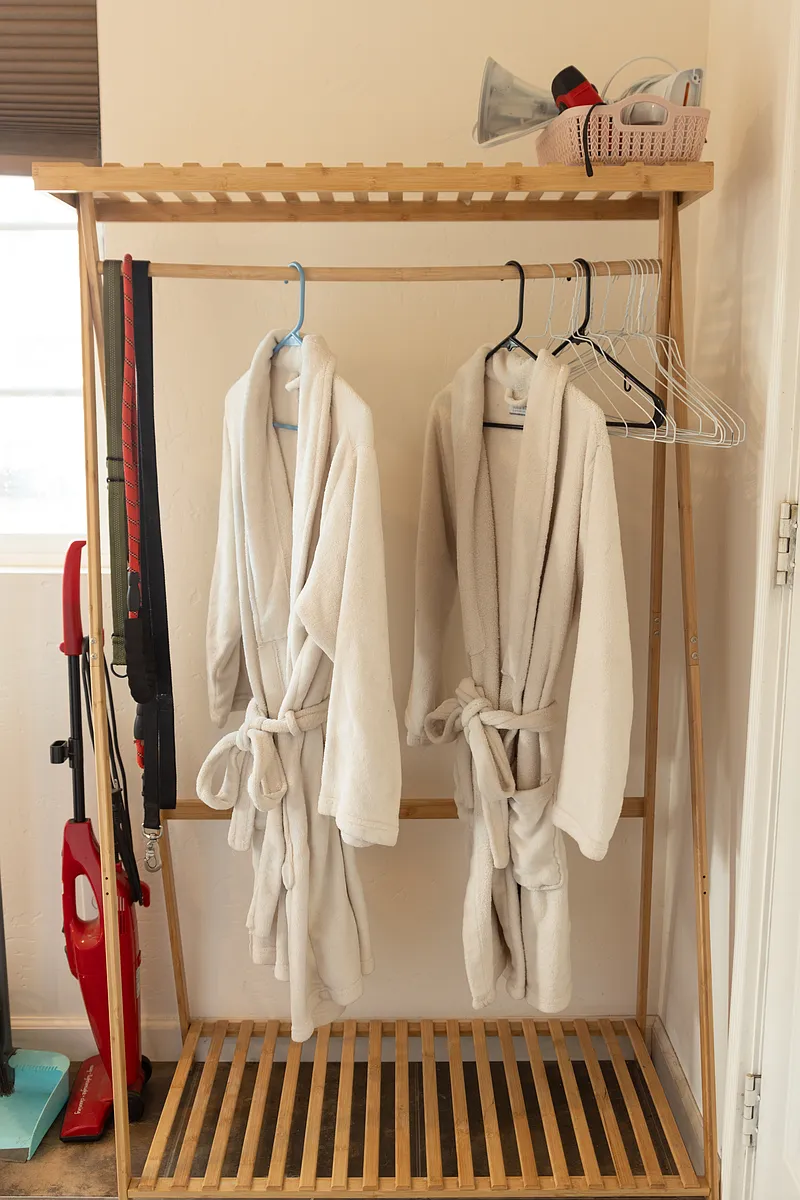 Clothing rack for use (no closet, but dresser also provided) - 4029 Violet St